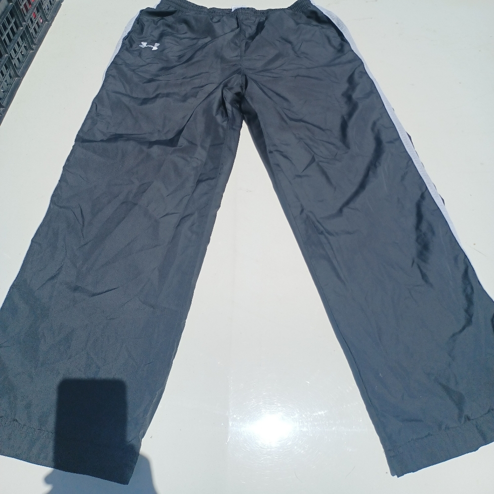 Under Armour track pants size youth XL color black with white stripe